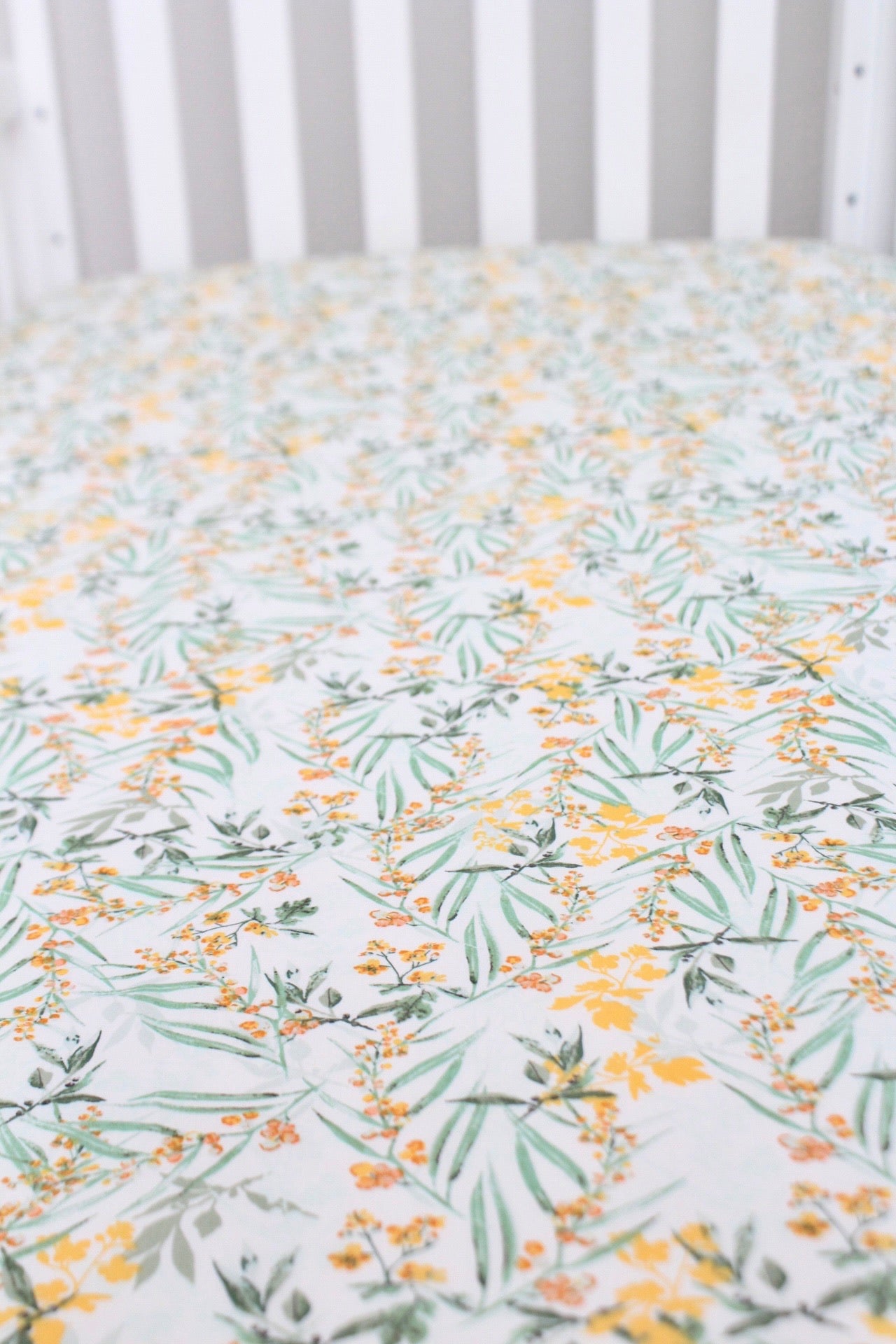 Yellow floral cheap crib sheet